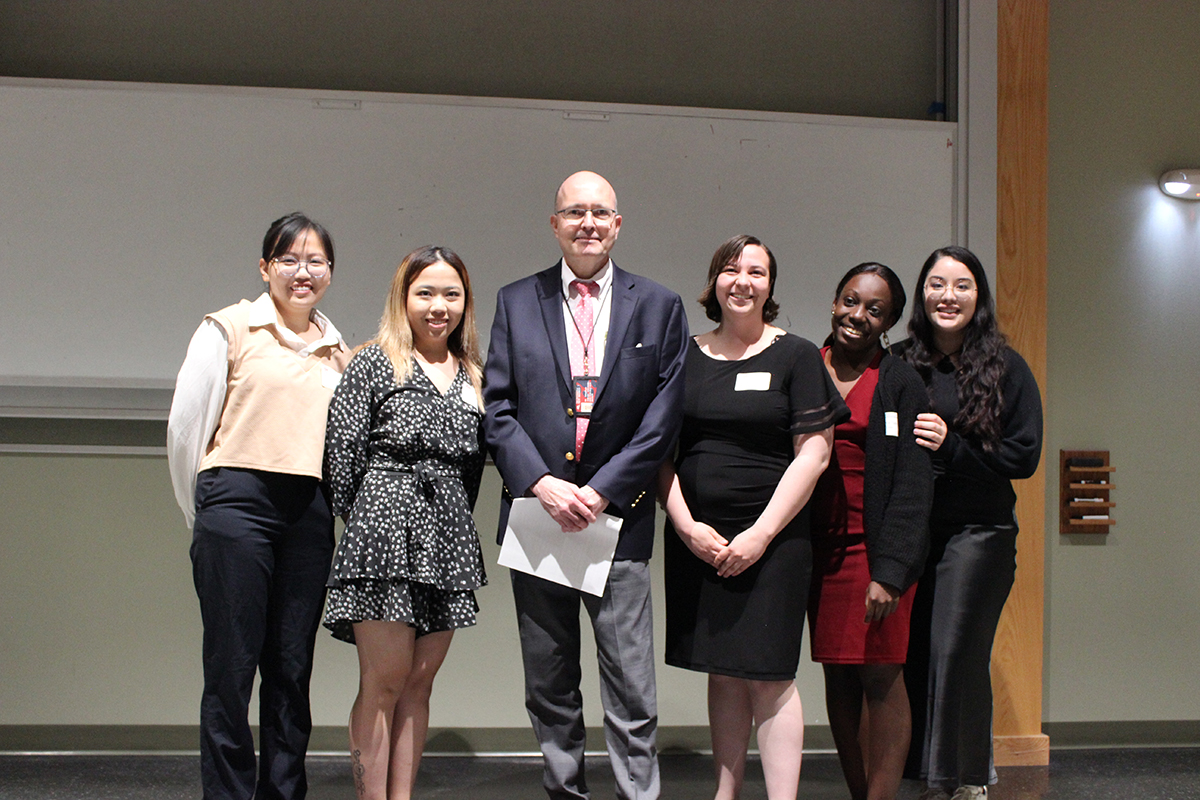 photo: Edl Schamiloglu, associate dean for research and innovation, stands with the winning team for both the pitch and the poster competition, Conversion to Corn Stover to Ethanol in Iowa, USA.