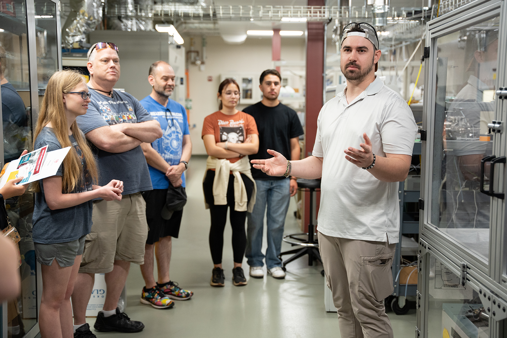 photo: person leading a tour of the laboratory facilities during a previous open house event.