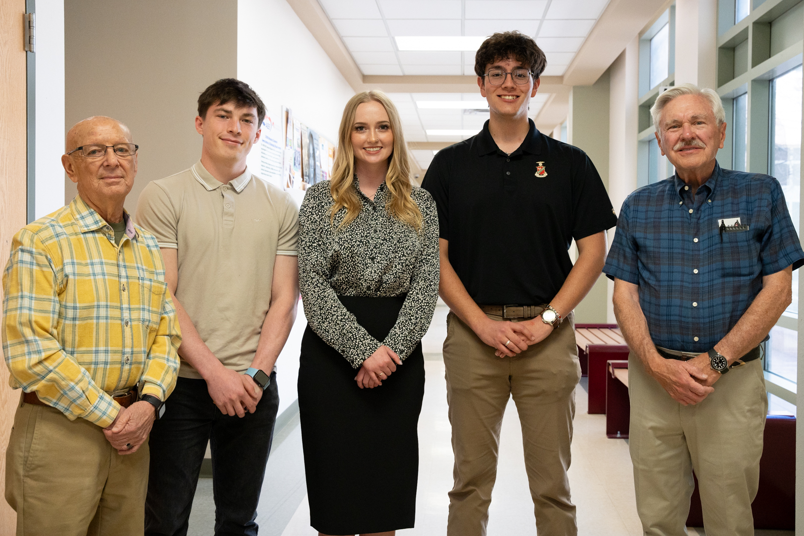 photo: From left to right: John Russell, director of LoboMotorsports, stands with students Benjamin Gannon, Victoria Udall, and Jose Garcia, and donor Jim King at a Mechanical Engineering Scholar and Donor Luncheon, last spring.