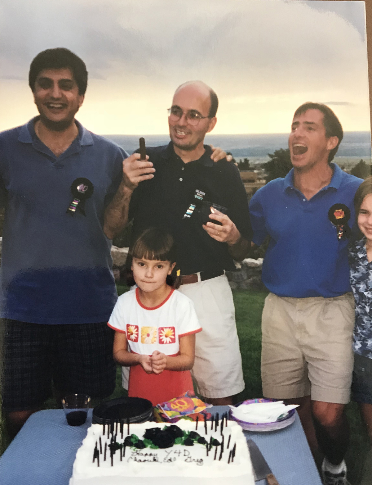 photo of Edl Schamiloglu and family with birthday cake